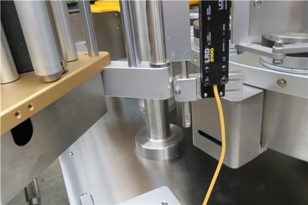 Высокоскоростная роторная машина для прикрепления этикеток стикера с поясом вариантов машины завалки