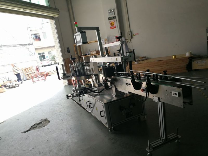 Китай Двусторонняя этикетировочная машина для круглых бутылок, ширина этикетки 190 мм поставщик