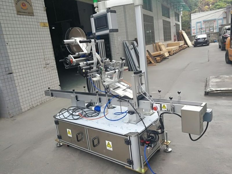 Китай Наклейка Верхняя этикетировочная машина для мешка с соплом с электроприводом поставщик